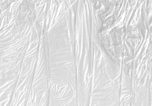 istock White Plastic wrinkle Bag Film Glossy Cumpled Overlay Package Background Rough Wrap Material Pack Reflection Texture Floor Packaging Retail Grain Pollution Trash, surface wrinkled Foil Polyethylene. 2198930679