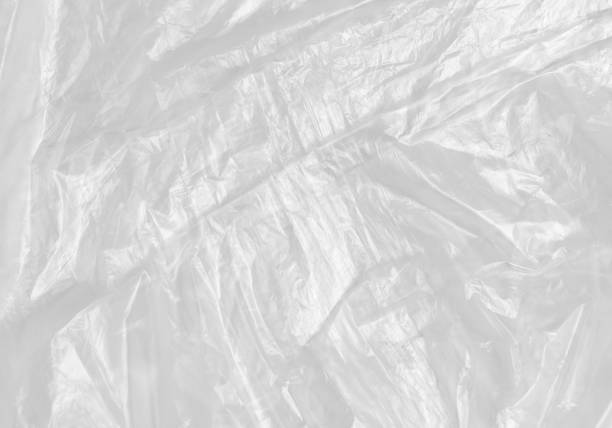 istock White Plastic wrinkle Bag Film Glossy Cumpled Overlay Package Background Rough Wrap Material Pack Reflection Texture Floor Packaging Retail Grain Pollution Trash, surface wrinkled Foil Polyethylene. 2198930707