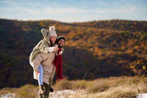 istock Carefree couple enjoying on a mountain 2198931649