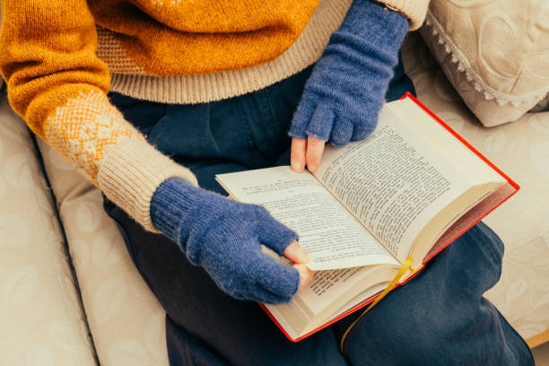 istock Relaxing with a book and hot drink 2198931664