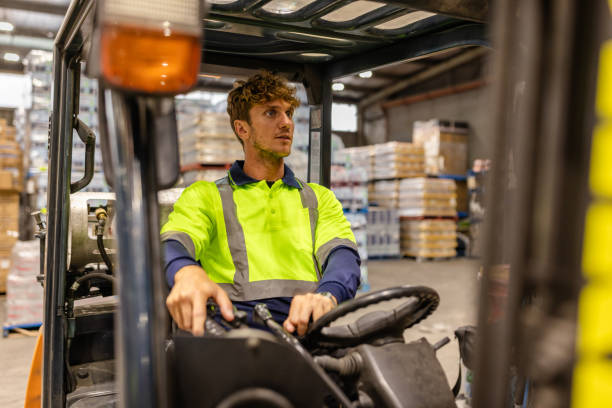 istock Men working in a distribution warehouse in Sydney, Australia, focusing on e-commerce logistics and safety practices 2198931675
