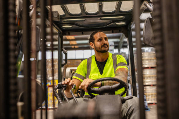 istock Men working in a distribution warehouse in Sydney, Australia, evaluating efficiency and safety in e-commerce operations 2198932027
