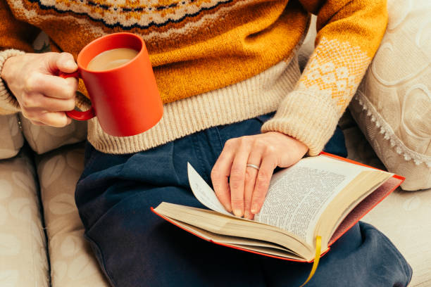 istock Relaxing with a book and hot drink 2198932036