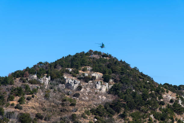 Shandong, China- May 27, 2016: Tai Mountain is one of Five Greatest Mountains in China. It is the UNESCO Natural and Cultural Heritage Site. In the long history over 2000 years, many splendid temples and monuments were bulit over here and many great persons has left numerous inscriptions in the Mountain's cliffs, now is the great culture heritage of the Mountain. Here are the tourists Climbing the mountain.