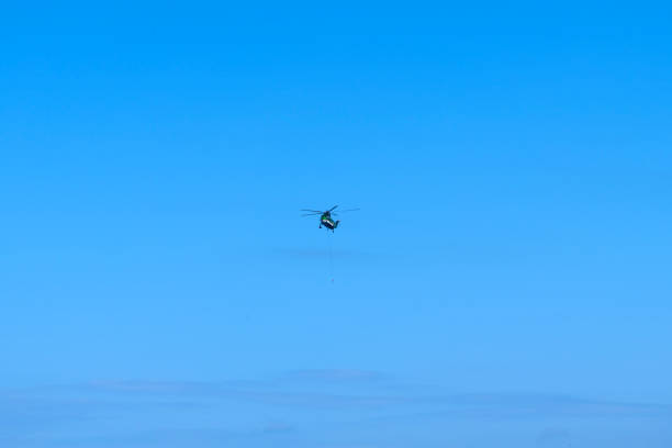 Dec 4 2024 against a clear blue sky, showcasing aviation and freedom