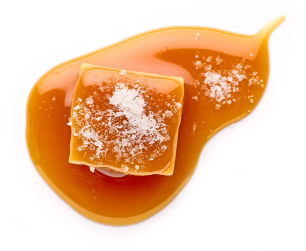 istock salted caramel candy in melted caramel sauc 2198934847