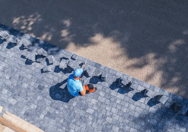istock Skilled Worker Laying Pavers in a Sunny Outdoor Space 2198936119