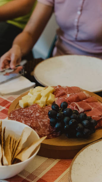 istock Charcuterie Board with Cheese and Grapes 2198938352