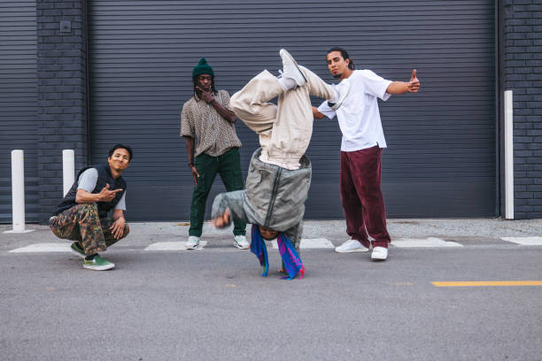 istock Young people breakdancing in the city streets 2198938835