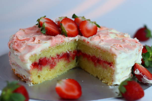 istock Buttermilk strawberry cake with rose pink icing and flower petal effect 2198939165