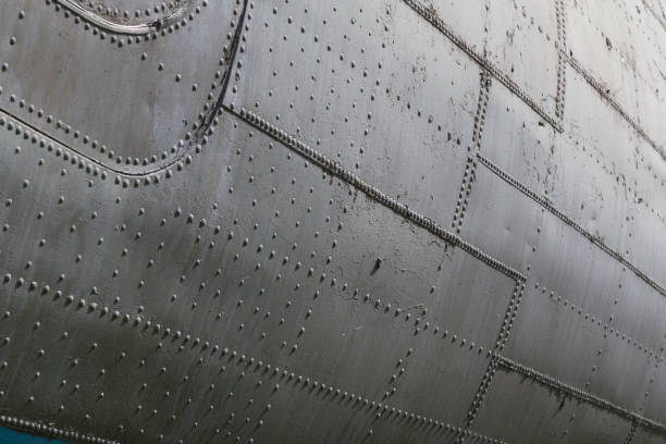 istock old aircraft finish, aluminum riveted skin 2198943375