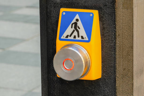 istock button to cross a pedestrian crossing. selected focus 2198944694