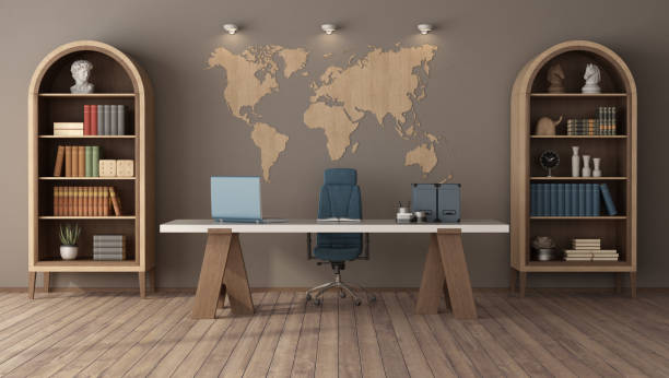Modern home office interior with wooden world map and bookshelves