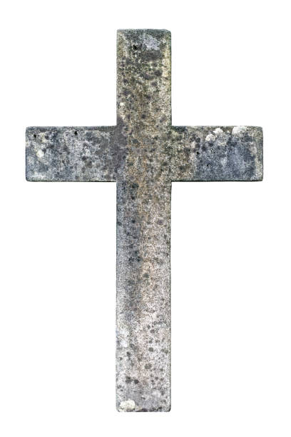 Old weathered grave cross made of stone isolated on white background