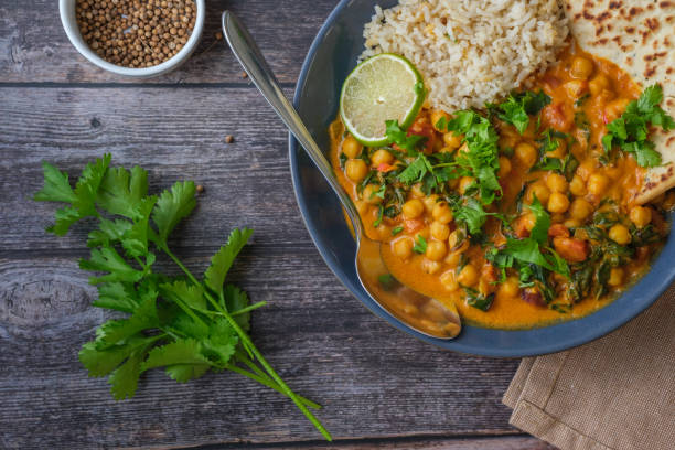 istock Vegan Chickpea curry against a wooden background. 2198951042
