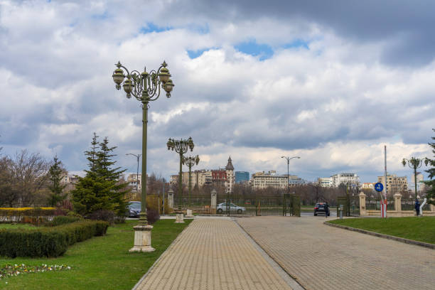 istock Landscape with old green trees in Bucharest downtown park 2198957280