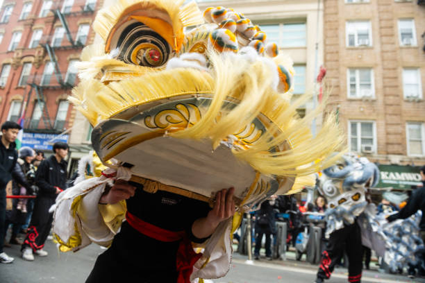 Februrary 8, 2025 - New York City, USA: Chinese lion dances are performed outdoors in the city streets of Chinatown during Super Saturday, an event celebrating the Lunar New Year.