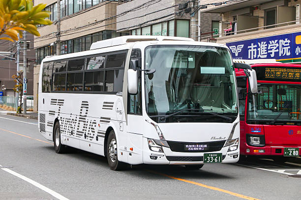 Chiba, Japan - January 12, 2025: White tourist bus Mitsubishi Fuso Aero Ace in the city street.
