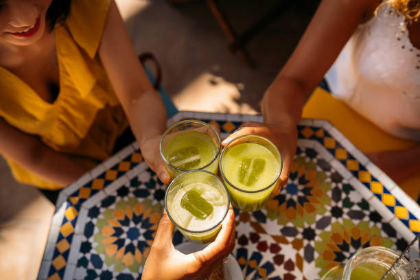 istock University exchange students toasting with exotic juice in morocco 2198959372