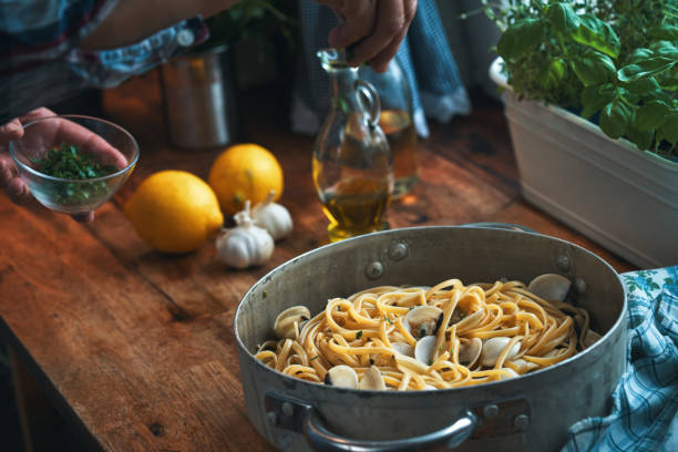 Bottle of olive oil with fresh vegetables