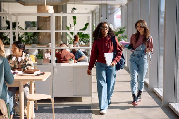 istock Female students going on a lecture at the university. 2198962161