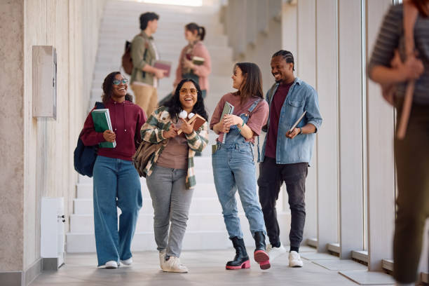 istock Happy university friends having fun after a lecture. 2198962236