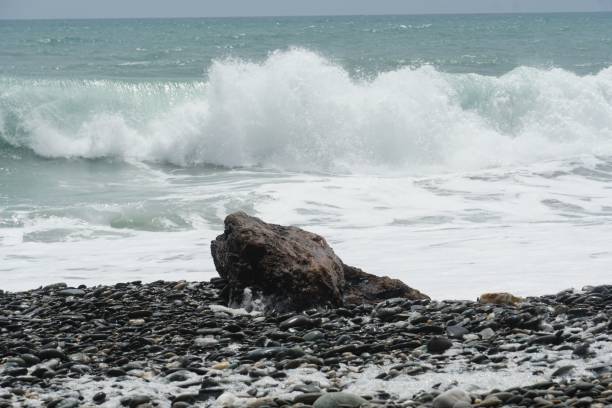 istock Scenic coastal view with crashing waves 2198968578