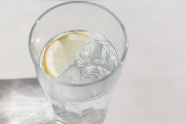 istock Enjoy a glass of Refreshing Lemon Water served with Ice for a delightful experience 2198969322
