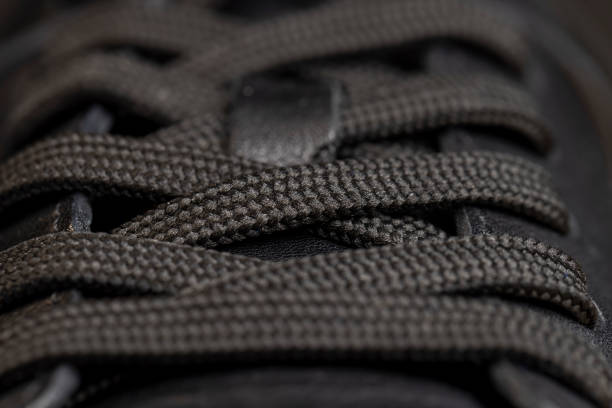 istock black synthetic laces for tying shoes 2198976113