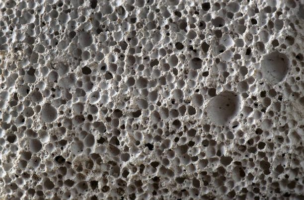 istock white pumice stone texture background. close up. top view 2198977949