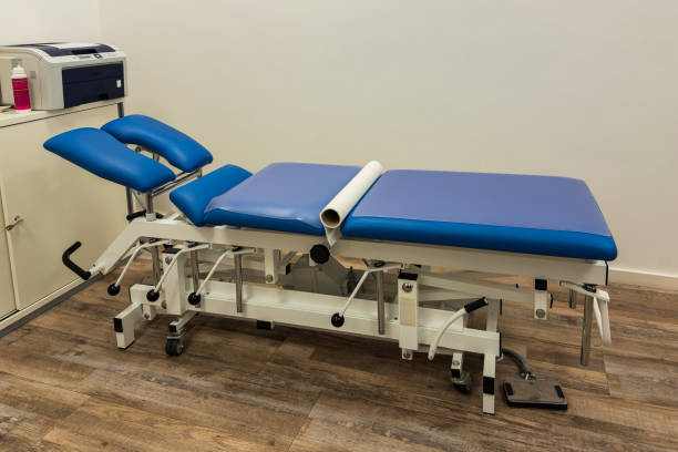 istock Blue medical bed in doctor office 2198981034
