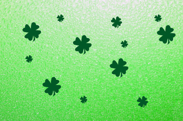 St. Patrick's Day, Irish Holiday background. Celebrate springtime holiday with this sparkling green background and shamrocks.