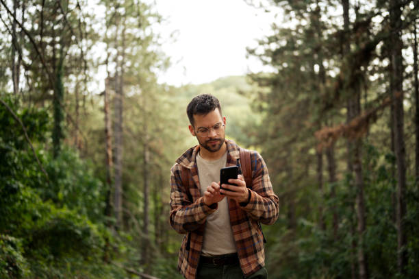 istock Young male walking thought the forrest 2198987614