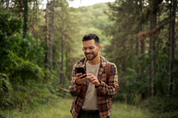 istock Young male walking thought the forrest 2198987634