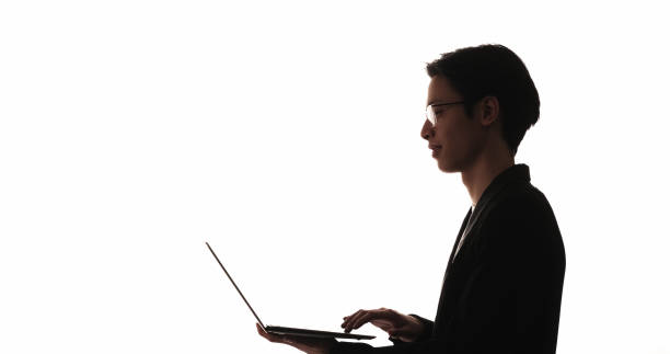 istock Working silhouette remote job business man laptop 2198990885