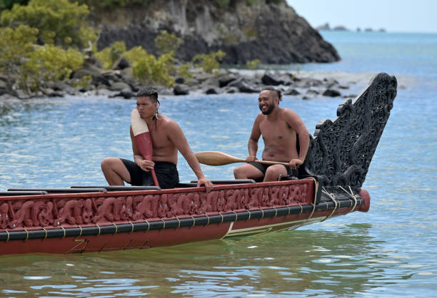 Friends enjoying with a canoe in a lake.