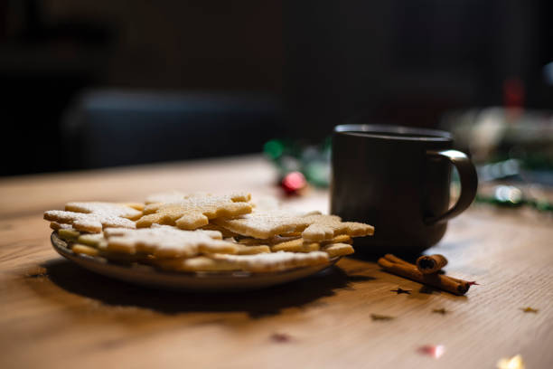 Delightful Christmas cookies with warm drink on a cozy table during the festive season