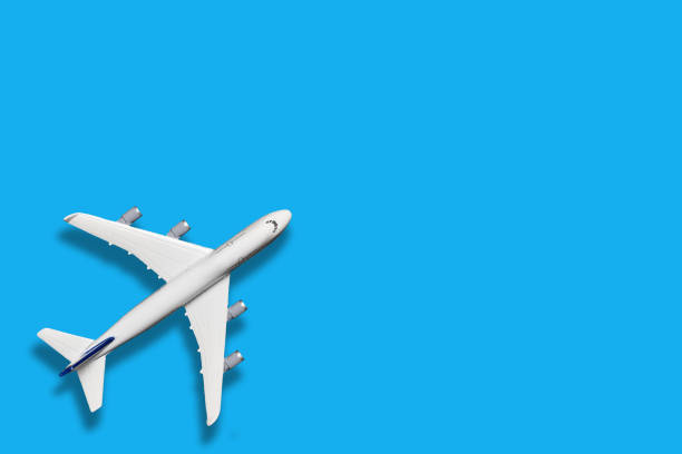 istock Model airplane on blue color background. 2199004836