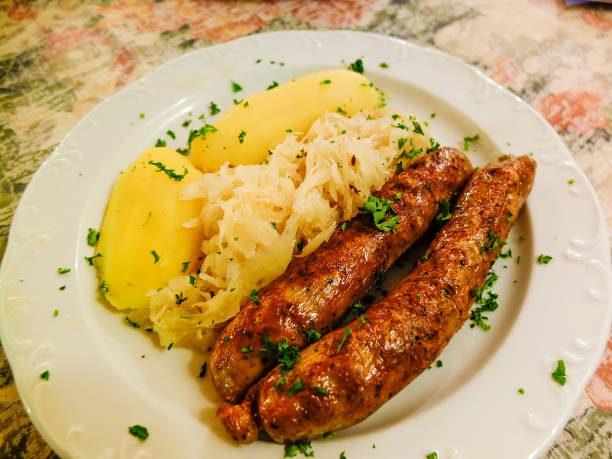 Pan roasted sausages with sauerkraut and potatoes