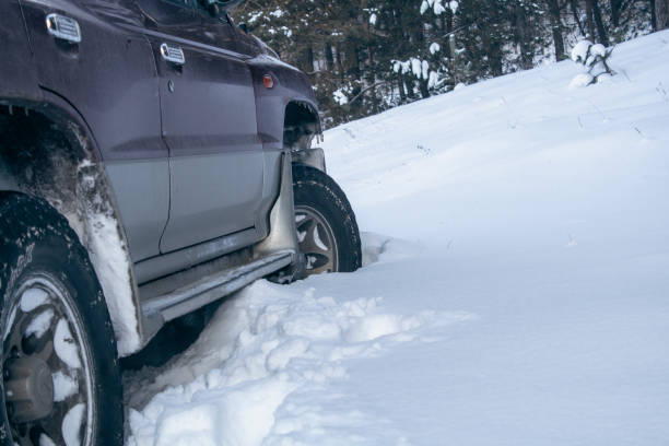 istock SUV stuck in the snow 2199007788