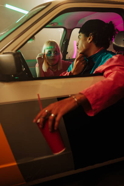 istock Retro stylish couple at drive thru. 2199008552