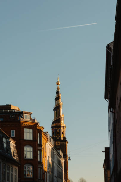 golden architectural spire building in historic city in Copenhagen, Denmark