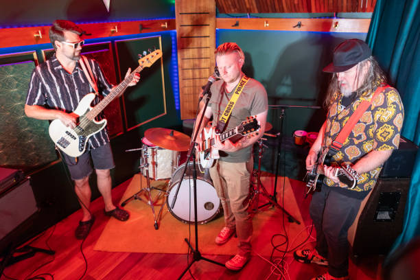 istock Middle Aged Men Playing in a Rock Music Band 2199021694