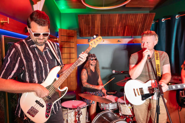Middle Aged Men Playing in a Rock Music Band
