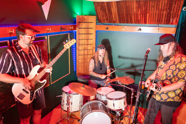 Middle Aged Men Playing in a Rock Music Band