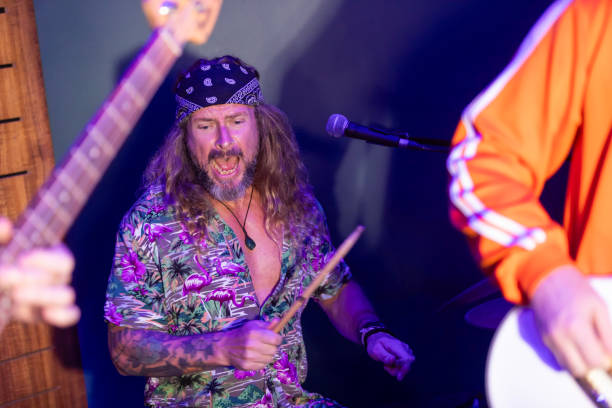 istock Energetic Middle Aged Drummer Playing Music 2199021743