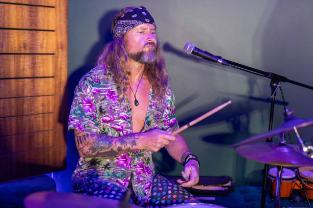 istock Energetic Middle Aged Drummer Playing Music 2199021755