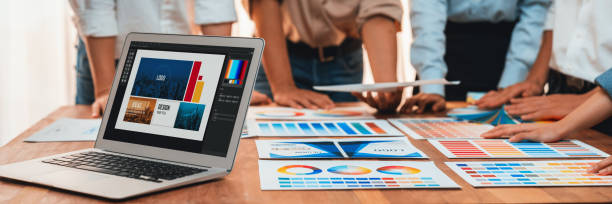 istock Graphic designer brainstorming logo and graphic arts at workshop. Scrutinize 2199021863