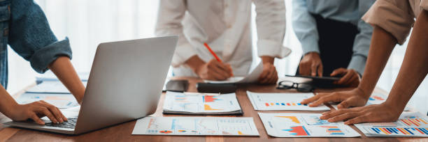 istock Analyst team utilizing BI Fintech to analyze financial report. Scrutinize 2199021929