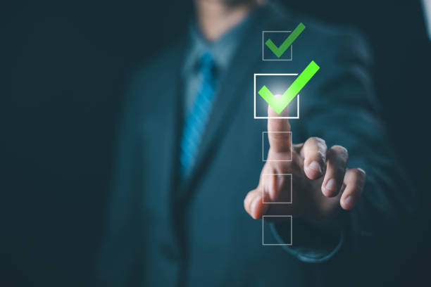 istock tick check mark in a checklist. concept of online list questionnaire, report, and evaluation. a checkmark in the document survey, form audit, and certificate digital, process of audit 2199023399